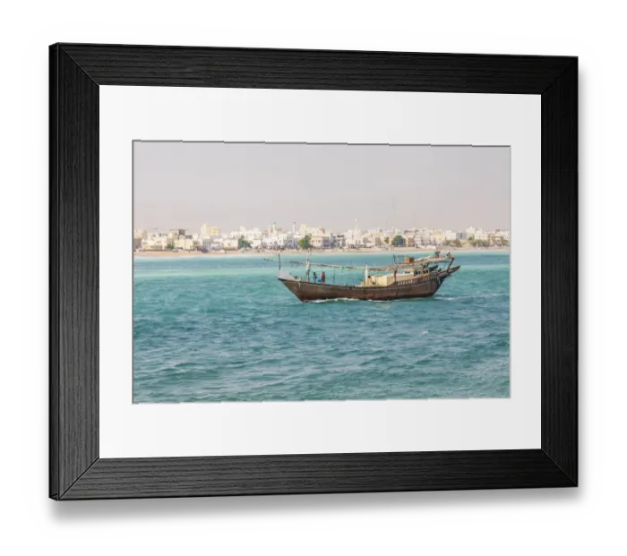 Framed Print : Middle East, Arabian Peninsula, Al Batinah South. Traditional dhow in the harbor at Sur