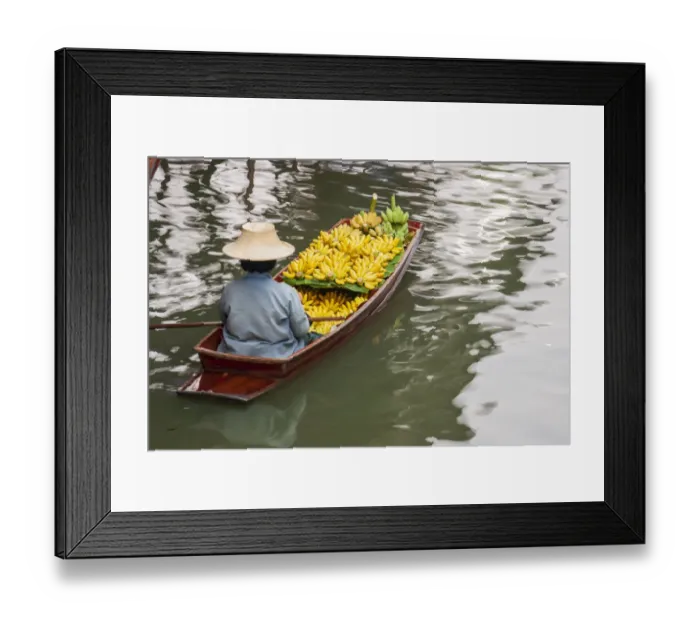 Framed Print : Damnoen Saduak Floating Market, Bangkok, Thailand. Woman with boatload of bananas Framed Print : Damnoen Saduak Floating Market, Bangkok, Thailand. Woman with boatload of bananas