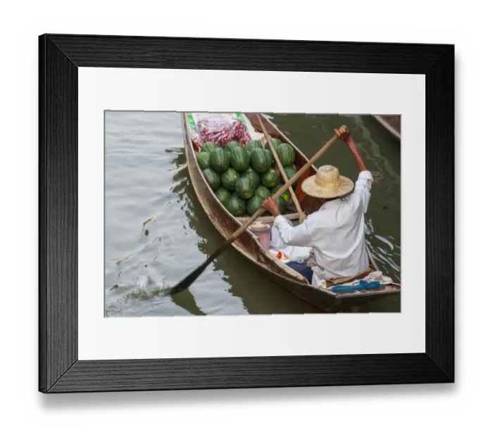 Framed Print : Damnoen Saduak Floating Market, Bangkok, Thailand. Man with a boatload of watermelons for Framed Print : Damnoen Saduak Floating Market, Bangkok, Thailand. Man with a boatload of watermelons for