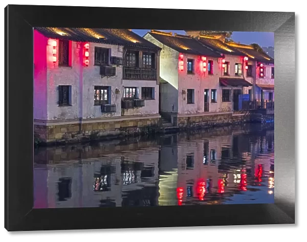 Night view of traditional houses along the Grand Canal, Wuxi, Jiangsu Province, China