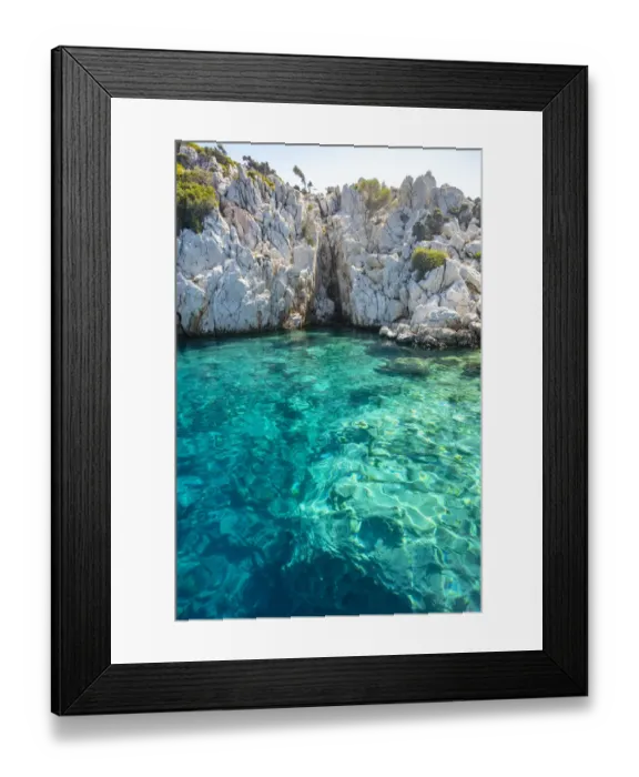Framed Print : Turquoise colored crystal clear water at a rocky island, Aegean Sea, Turkey Framed Print : Turquoise colored crystal clear water at a rocky island, Aegean Sea, Turkey