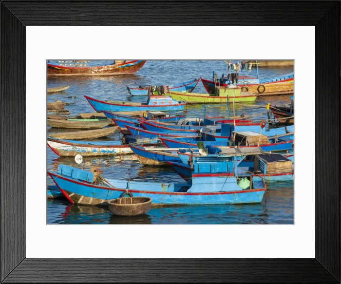 Framed Print : Distinctive red and blue fishing fleet in major fishing port of Nha Trang Framed Print : Distinctive red and blue fishing fleet in major fishing port of Nha Trang