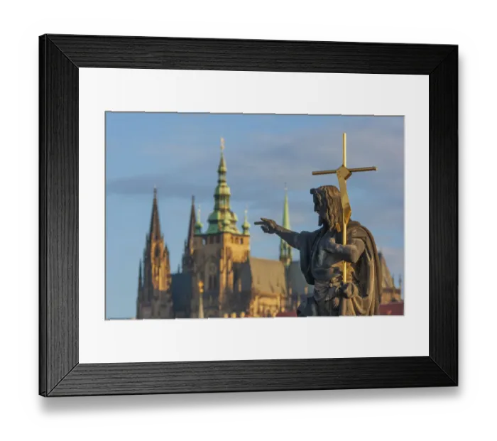 Framed Print : Statue of St. John the Baptist on the Charles Bridge with the Prague Castle and St Framed Print : Statue of St. John the Baptist on the Charles Bridge with the Prague Castle and St