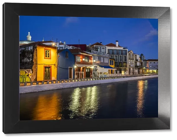 Europe, Portugal, Aveiro. Sunset on buildings and canal