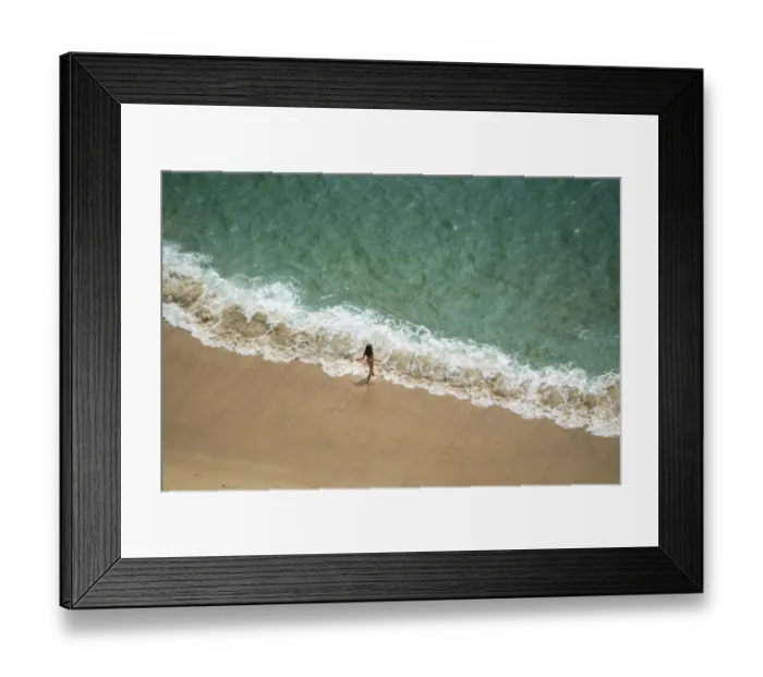 Framed Print : Europe, Portugal, Nazare. Girl in surf on beach Framed Print : Europe, Portugal, Nazare. Girl in surf on beach