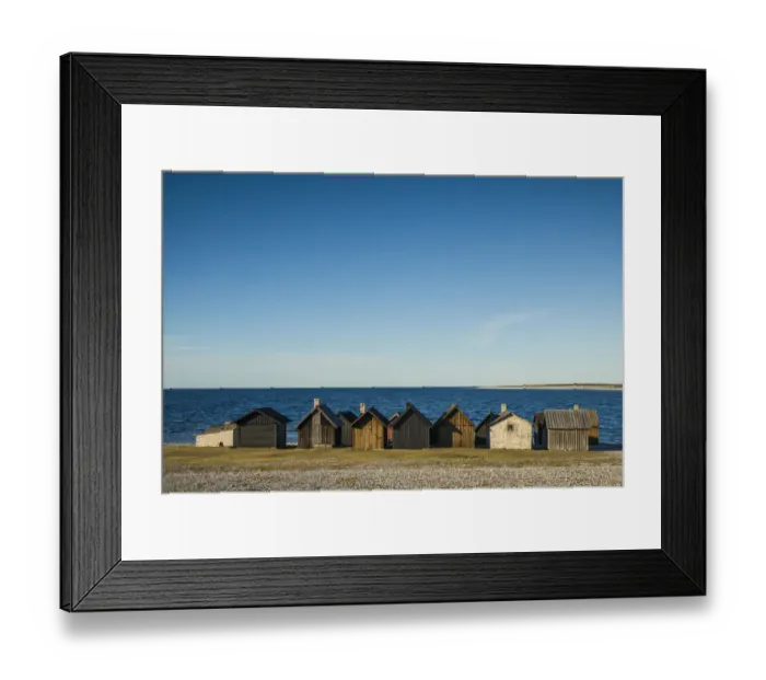 Framed Print : Sweden, Faro Island, Kursviken, coastal farmers fishing shacks, sunset