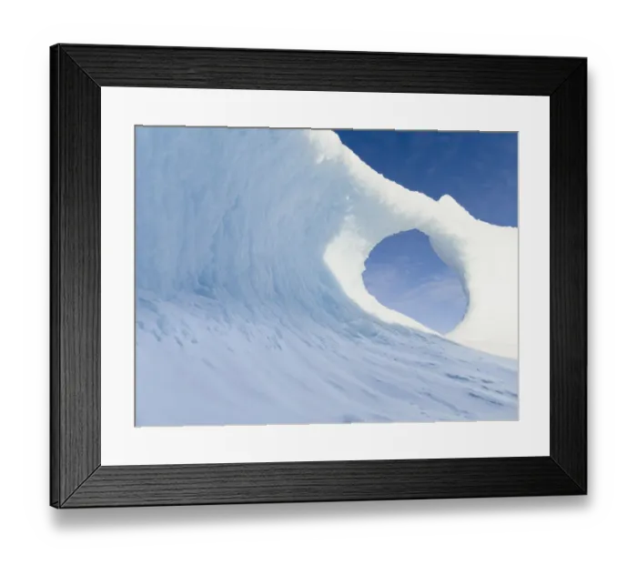 Framed Print : Iceberg frozen into the sea ice of the Uummannaq fjord system during winter Framed Print : Iceberg frozen into the sea ice of the Uummannaq fjord system during winter