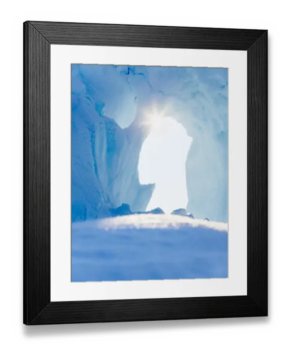 Framed Print : Iceberg frozen into the sea ice of the Uummannaq fjord system during winter Framed Print : Iceberg frozen into the sea ice of the Uummannaq fjord system during winter