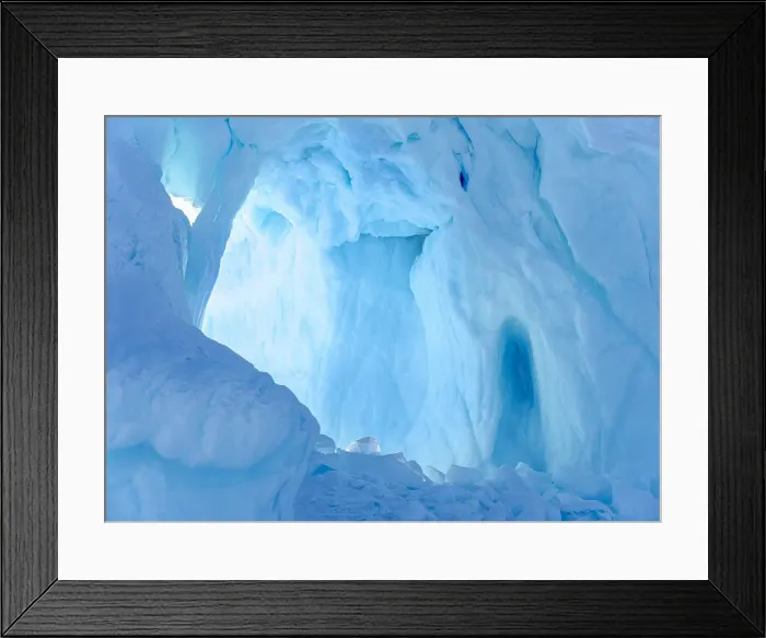 Framed Print : Iceberg frozen into the sea ice of the Uummannaq fjord system during winter Framed Print : Iceberg frozen into the sea ice of the Uummannaq fjord system during winter