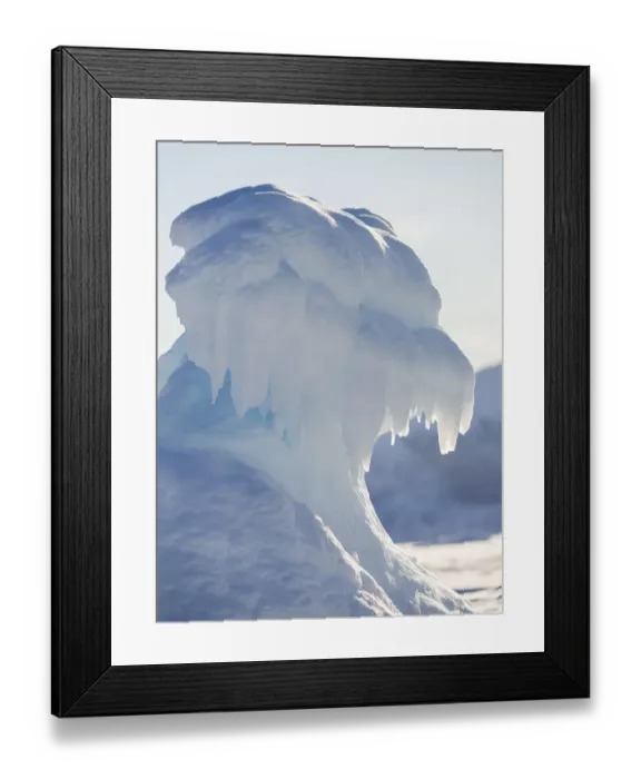 Framed Print : Iceberg frozen into the sea ice of the Uummannaq fjord system during winter