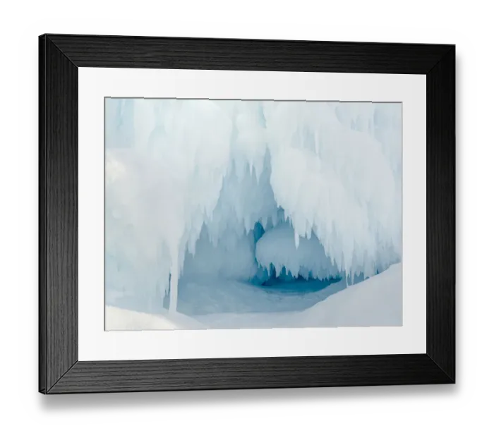 Framed Print : Iceberg frozen into the sea ice of the Uummannaq fjord system during winter Framed Print : Iceberg frozen into the sea ice of the Uummannaq fjord system during winter