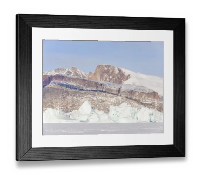 Framed Print : Icebergs frozen into the sea ice of the Uummannaq fjord system during winter Framed Print : Icebergs frozen into the sea ice of the Uummannaq fjord system during winter