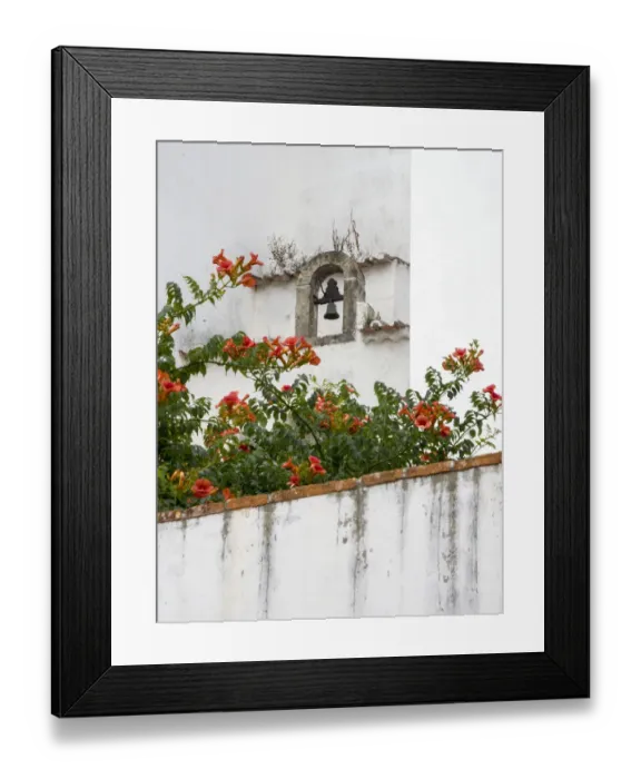 Framed Print : Portugal, Obidos. Orange trumpet vine growing below a church bell in the medieval village Framed Print : Portugal, Obidos. Orange trumpet vine growing below a church bell in the medieval village