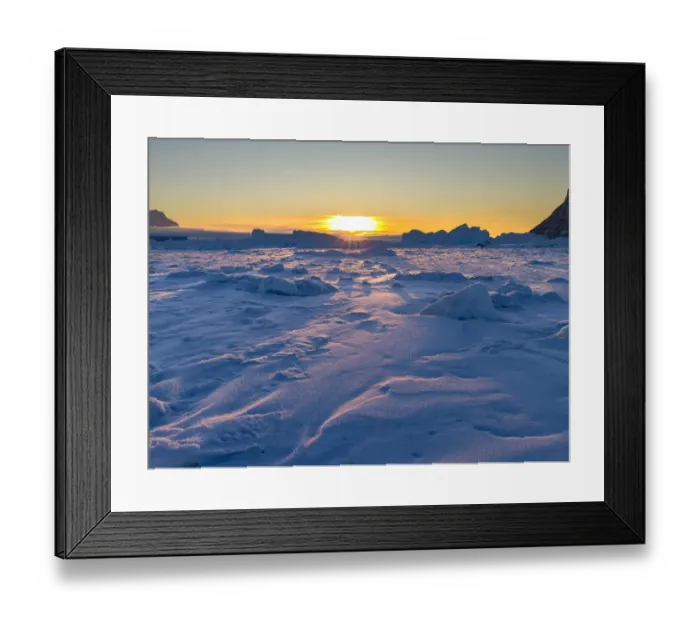 Framed Print : Icebergs frozen into the sea ice of the Uummannaq fjord system during winter