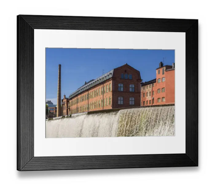Framed Print : Sweden, Norrkoping, early Swedish industrial town, factory buildings and waterfall Framed Print : Sweden, Norrkoping, early Swedish industrial town, factory buildings and waterfall