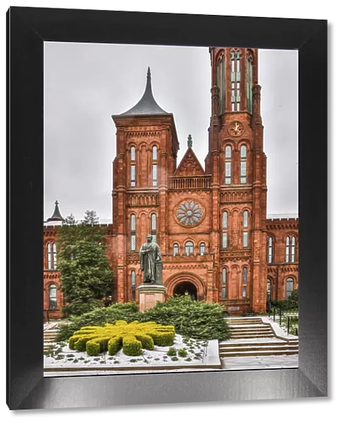 USA, District of Columbia. Smithsonian Castle on a snowy afternoon