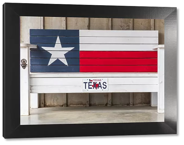 Luckenbach, Texas, USA. Bench painted like the Texas flag. (Editorial Use Only)
