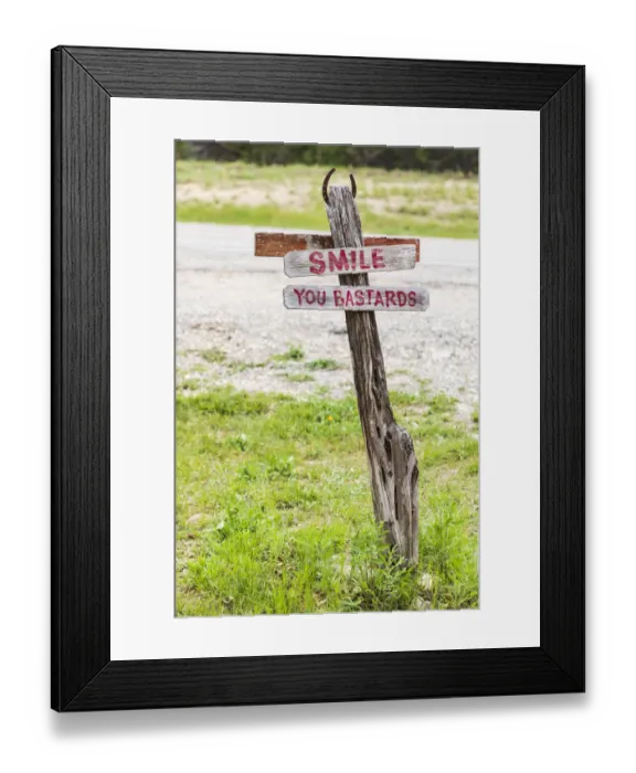 Framed Print : Comfort, Texas, USA. Humorous sign in the Texas Hill Country. (Editorial Use Only) Framed Print : Comfort, Texas, USA. Humorous sign in the Texas Hill Country. (Editorial Use Only)