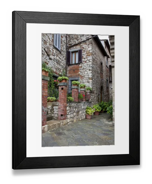 Framed Print : Italy, Radda in Chianti. Entrance to homes along the streets of Radda in Chianti