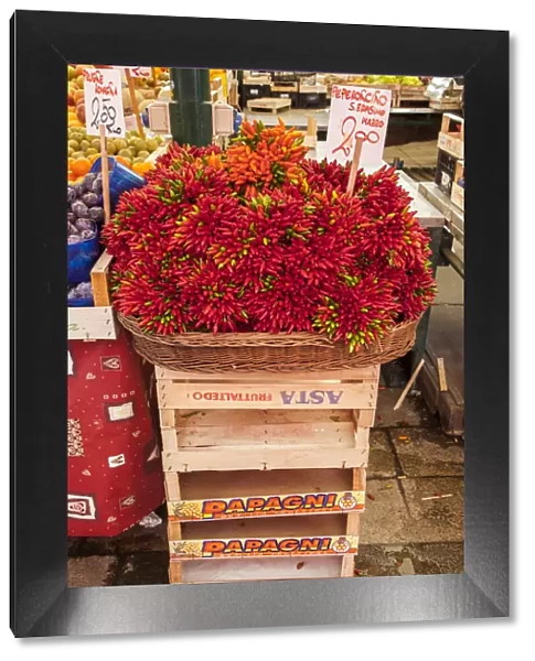 Italy, Venice. Colorful spicy peppers (pepperoncini) on display and for sale in the Rialto Market