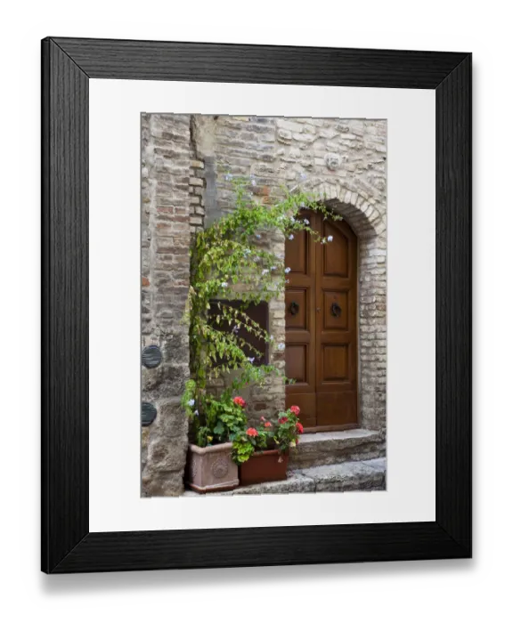Framed Print : Italy, Tuscany, San Gimignano. Homes decorated with flower pots along the streets of San Gimignano Framed Print : Italy, Tuscany, San Gimignano. Homes decorated with flower pots along the streets of San Gimignano