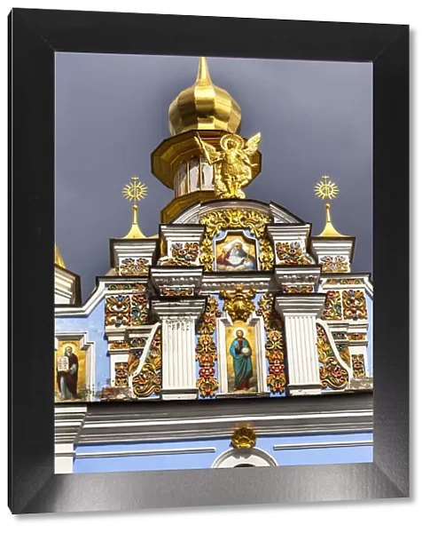 St. Michaels Golden-Domed Monastery, Steeple Spire Facade, Kiev, Ukraine. Saint Michaels is a functioning Greek Orthodox Monastery in Kiev. The monastery was created in the 1100s but was destroyed by the Soviet Union in the 1930 s