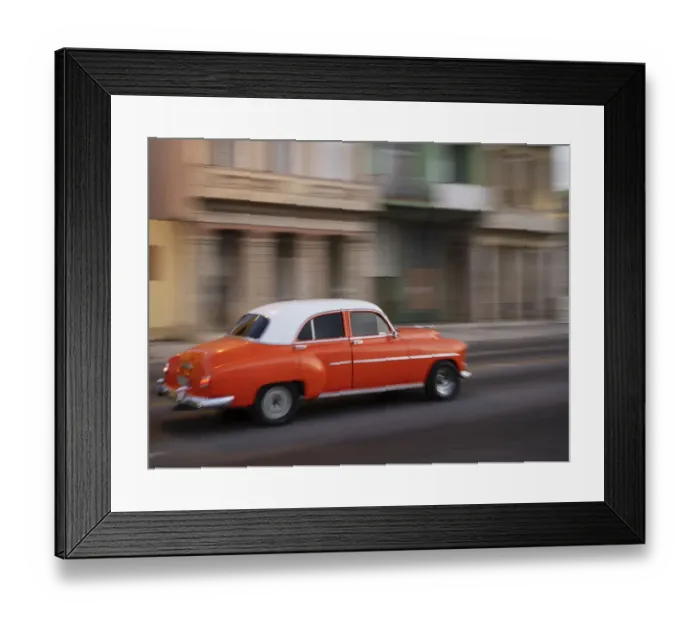 Framed Print : Cuba, Havana, Havana Vieja, UNESCO World Heritage Site, classic red car in motion
