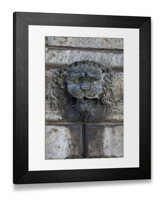 Framed Print : Italy, Tuscany, Montepulciano. Carving of a lions head on a stone building Framed Print : Italy, Tuscany, Montepulciano. Carving of a lions head on a stone building