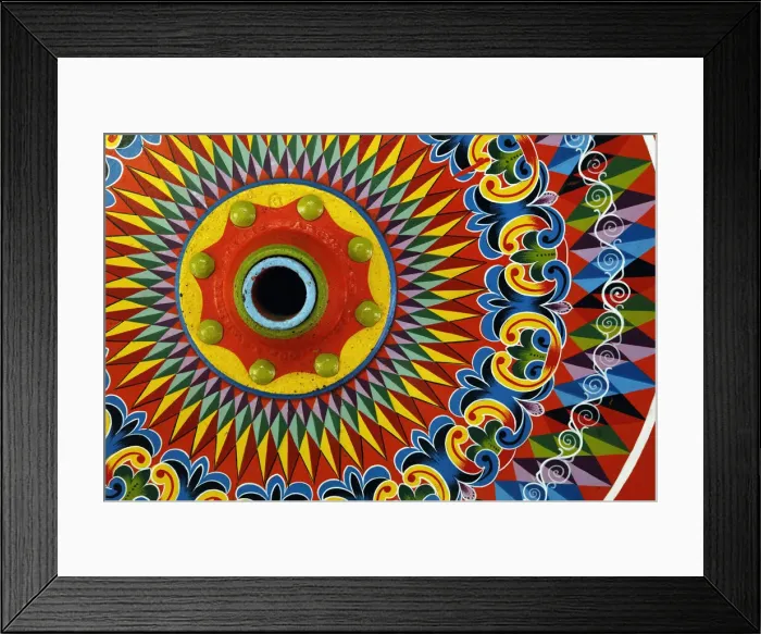 Framed Print : Colorfully painted wagon wheel, Costa Rica Framed Print : Colorfully painted wagon wheel, Costa Rica