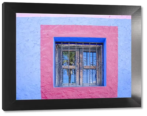 Cabo San Lucas, Mexico. Colorful wall and window