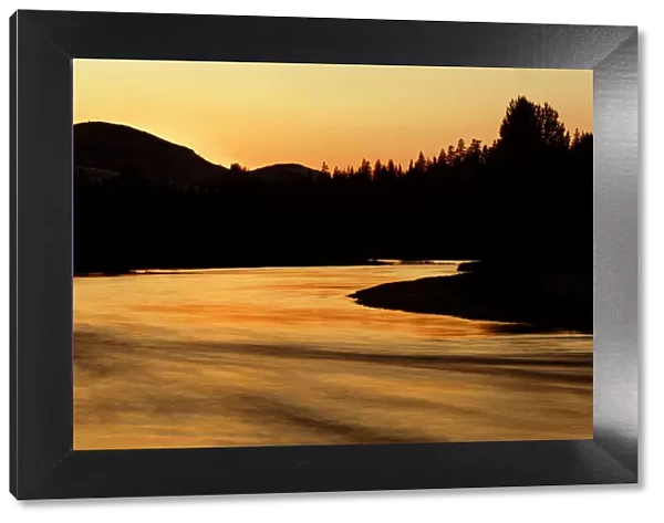 Sunset reflected on Tuolumne River, Tuolumne Meadows, Yosemite National Park, California