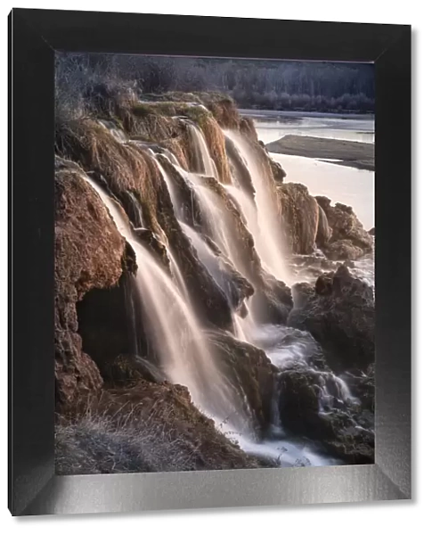USA, Idaho. Fall Creek Falls flow into Snake River at sunrise