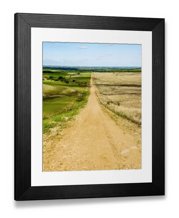 Framed Print : Road in the Flint Hills, dividing two colors of grass Framed Print : Road in the Flint Hills, dividing two colors of grass