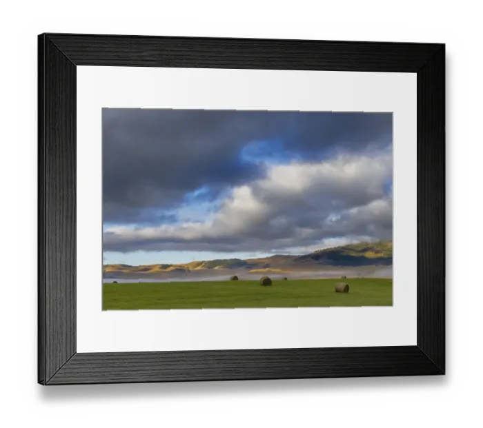 Framed Print : Hay bales in clearing fog with Salish Mountains in Lake County, Montana, USA Framed Print : Hay bales in clearing fog with Salish Mountains in Lake County, Montana, USA