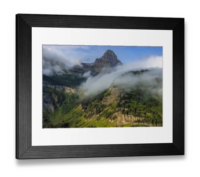Framed Print : Rolling fog clouds with Reynolds Mountains at Logan Pass in Glacier National Park, USA