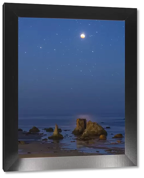 USA, Oregon, Bandon Beach. Lunar eclipse at night