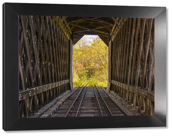 USA, Vermont, Fall foliage seen off Rt. 15, Wolcott, Fisher Covered Railroad Bridge (1908), Lamoille County