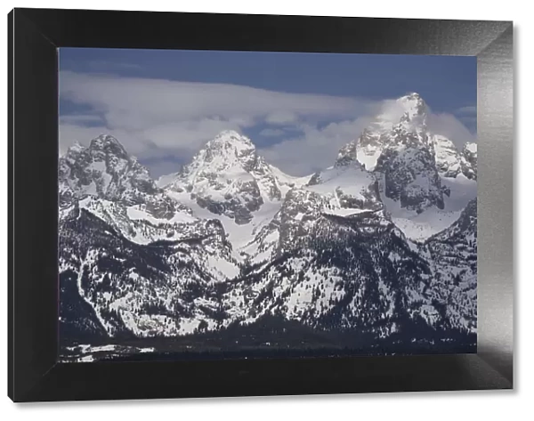 USA, Wyoming, Grand Teton National Park. Clouds over mountains after spring snowstorm