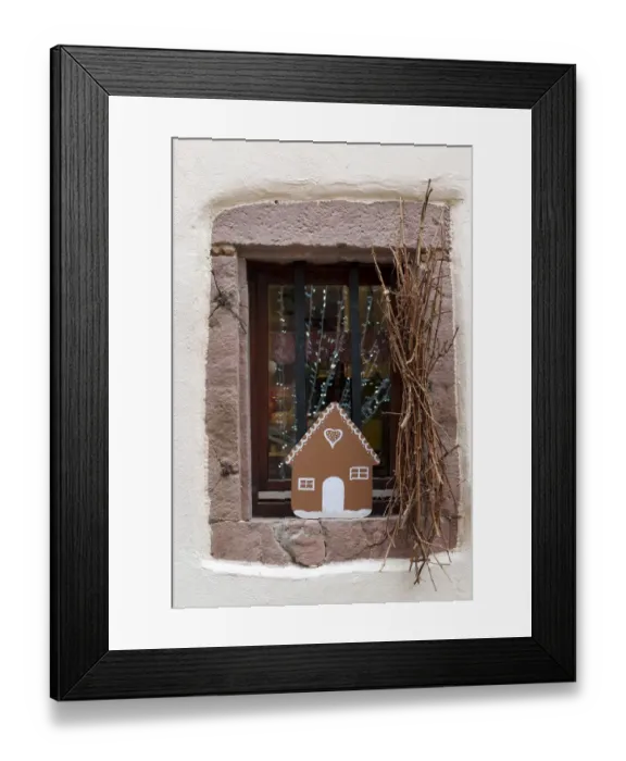 Framed Print : Riquewihr, France. Village established in the 1400s in the Alsace Region. Window decorated with Christmas ornaments