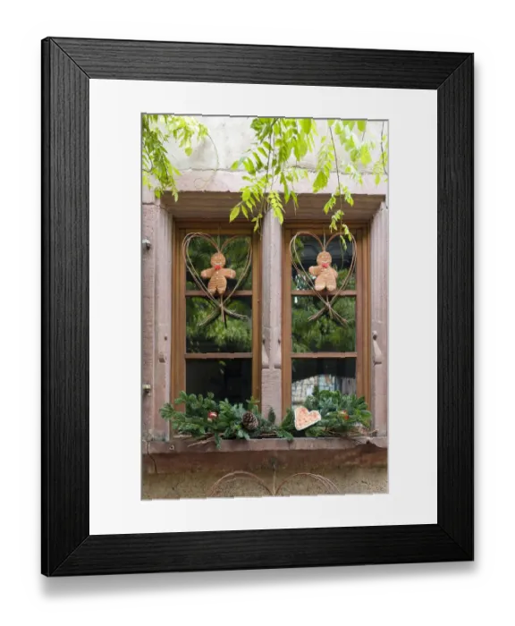 Framed Print : Riquewihr, France. Village established in the 1400s in the Alsace Region. Window decorated with Christmas ornaments