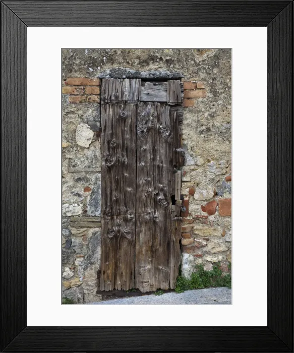 Framed Print : Italy, Tuscany, Monteriggioni. Old doorway in the walled town of Monteriggioni