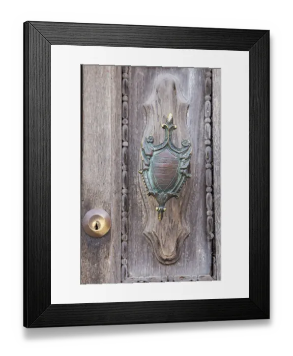 Framed Print : Italy, Venice, Burano Island. Closeup of brass detail on an old wooden door on Burano Island