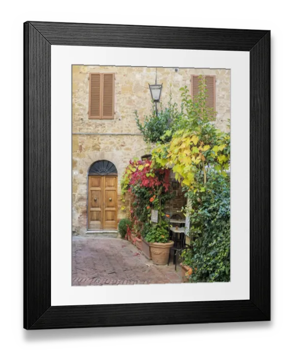 Framed Print : Italy, Tuscany, Pienza. Doorway surrounded by flowers Framed Print : Italy, Tuscany, Pienza. Doorway surrounded by flowers