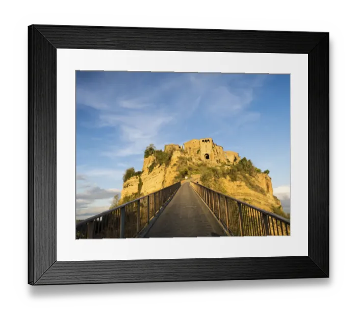 Framed Print : Italy, Tuscany, Civita di Bagnoregio. Evening view of the bridge
