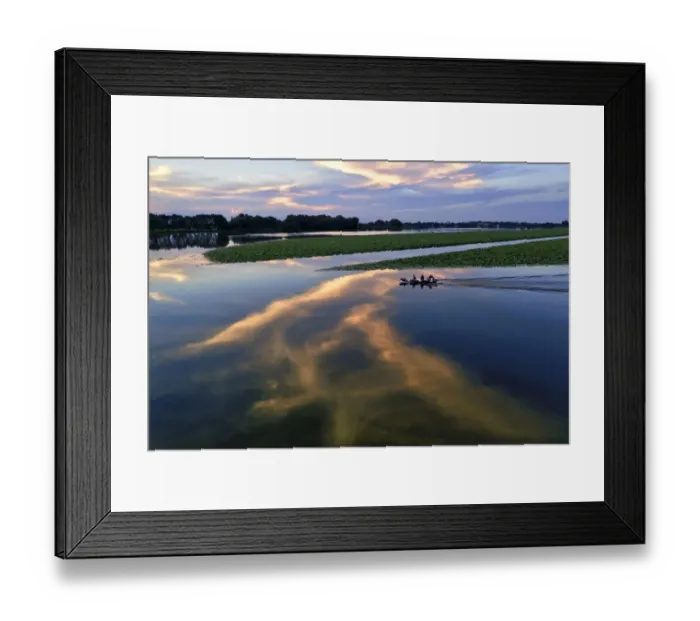 Framed Print : Italy, Mantova (Mantua). Sunset reflection and boat on lake Framed Print : Italy, Mantova (Mantua). Sunset reflection and boat on lake