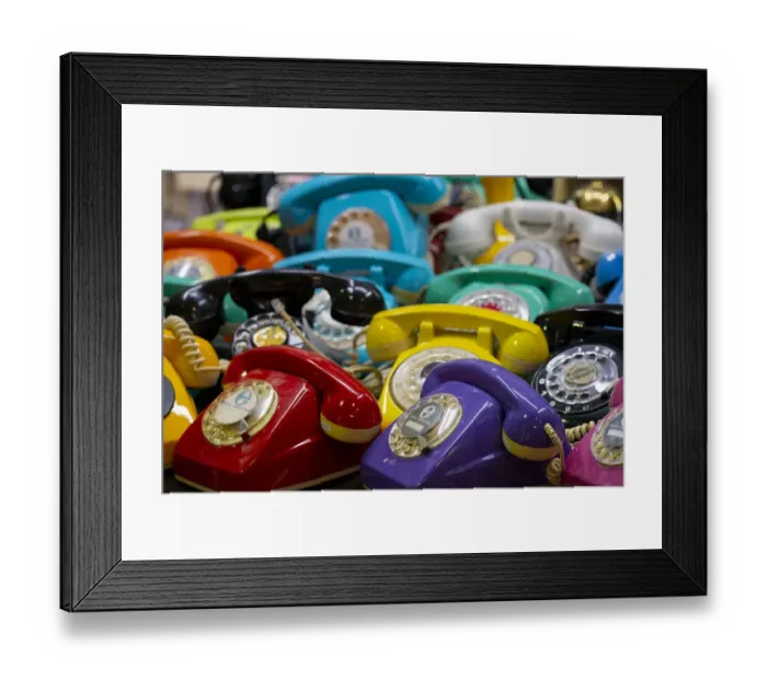 Framed Print : Argentina, Buenos Aires. San Telmo Market, aka Mercado San Telmo. Colorful vintage telephones
