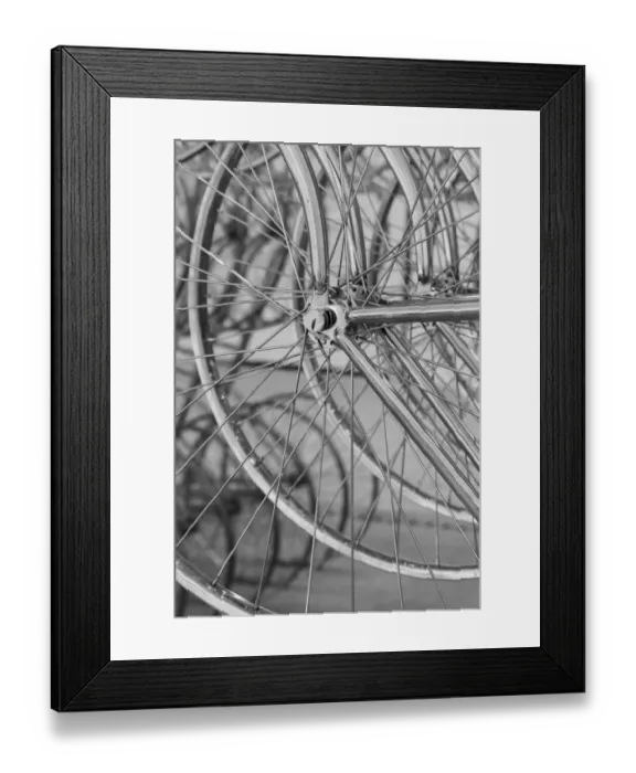 Framed Print : Metal bicycle wheels