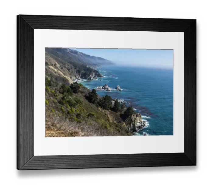 Framed Print : The rugged coastline of Big Sur, California. with wisps of fog floating into the hills Framed Print : The rugged coastline of Big Sur, California. with wisps of fog floating into the hills
