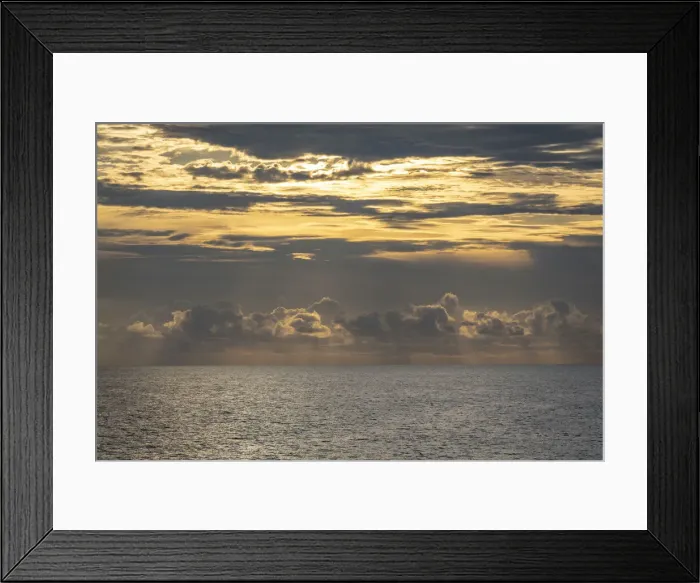 Framed Print : Dramatic skies, rain, sunbeams, sunset colors kiss the horizon of the Gulf of Mexico, Florida