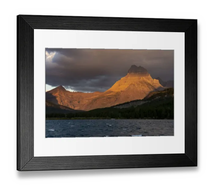 Framed Print : USA, Montana, Glacier National Park. Stormy sunrise on Mt Wilbur and lake Framed Print : USA, Montana, Glacier National Park. Stormy sunrise on Mt Wilbur and lake
